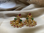 Temple-inspired Chandbali design with deity motif
