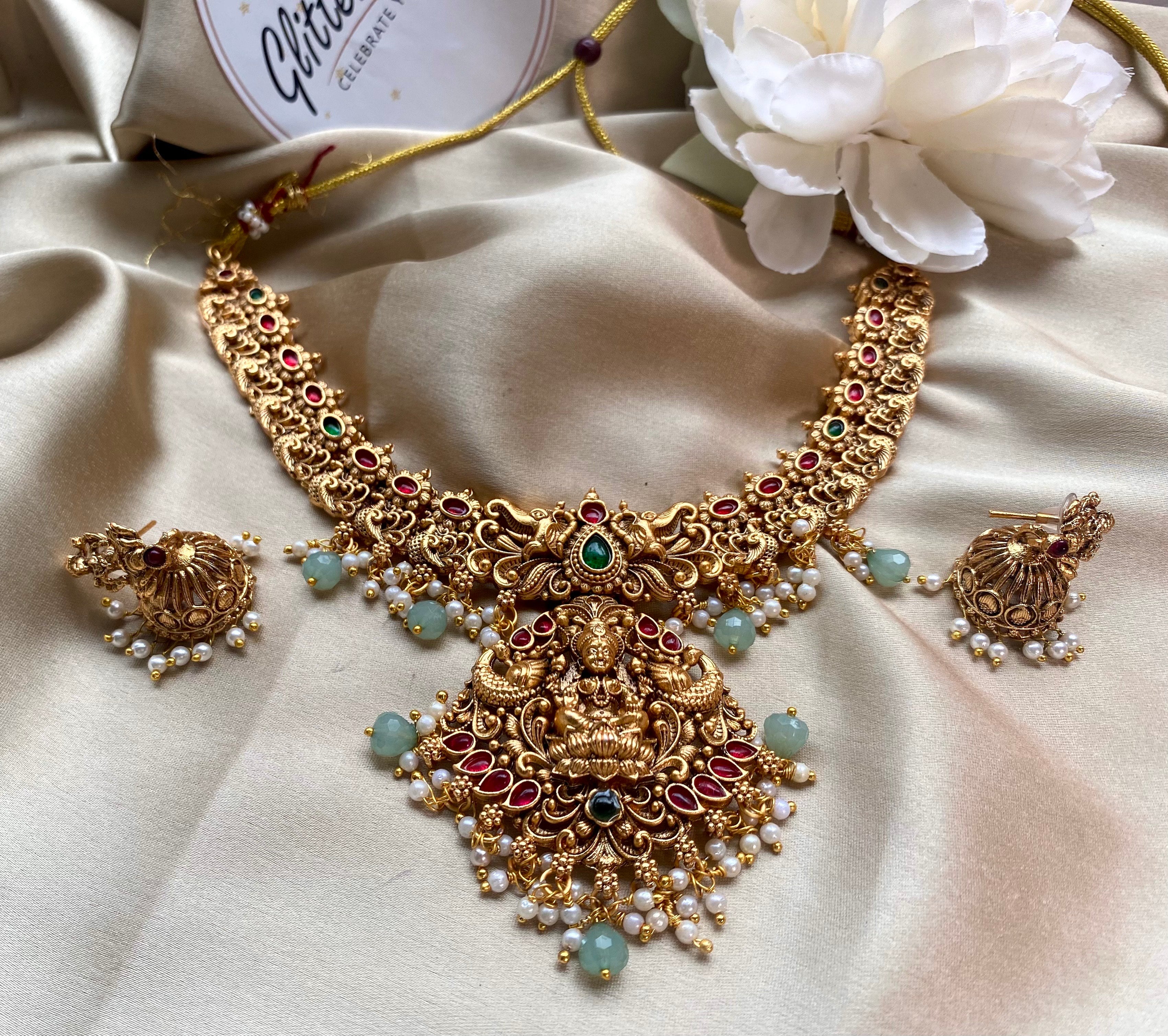 Antique temple-inspired design with goddess motifs