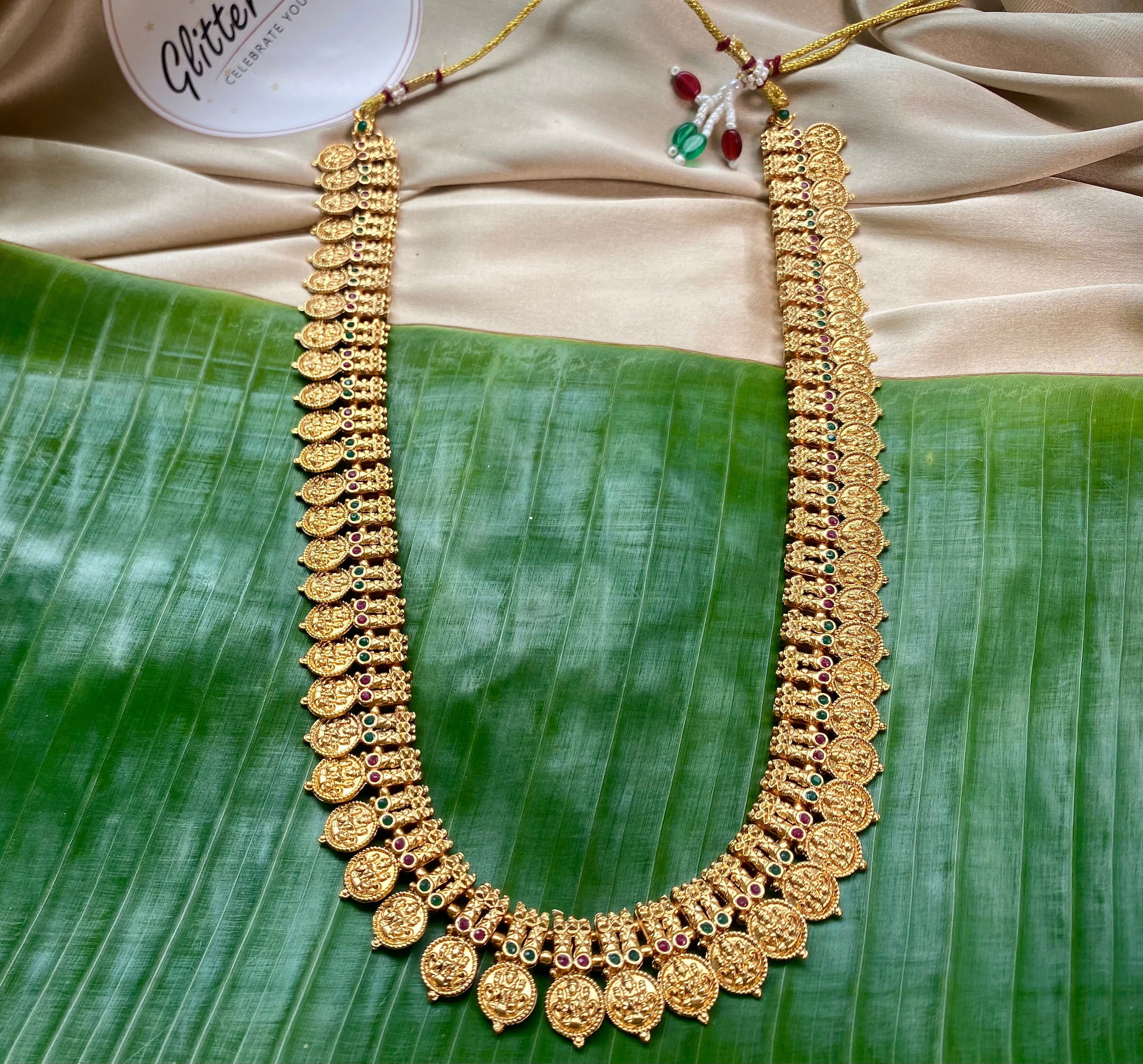 Antique gold finish with Lakshmi coin motifs