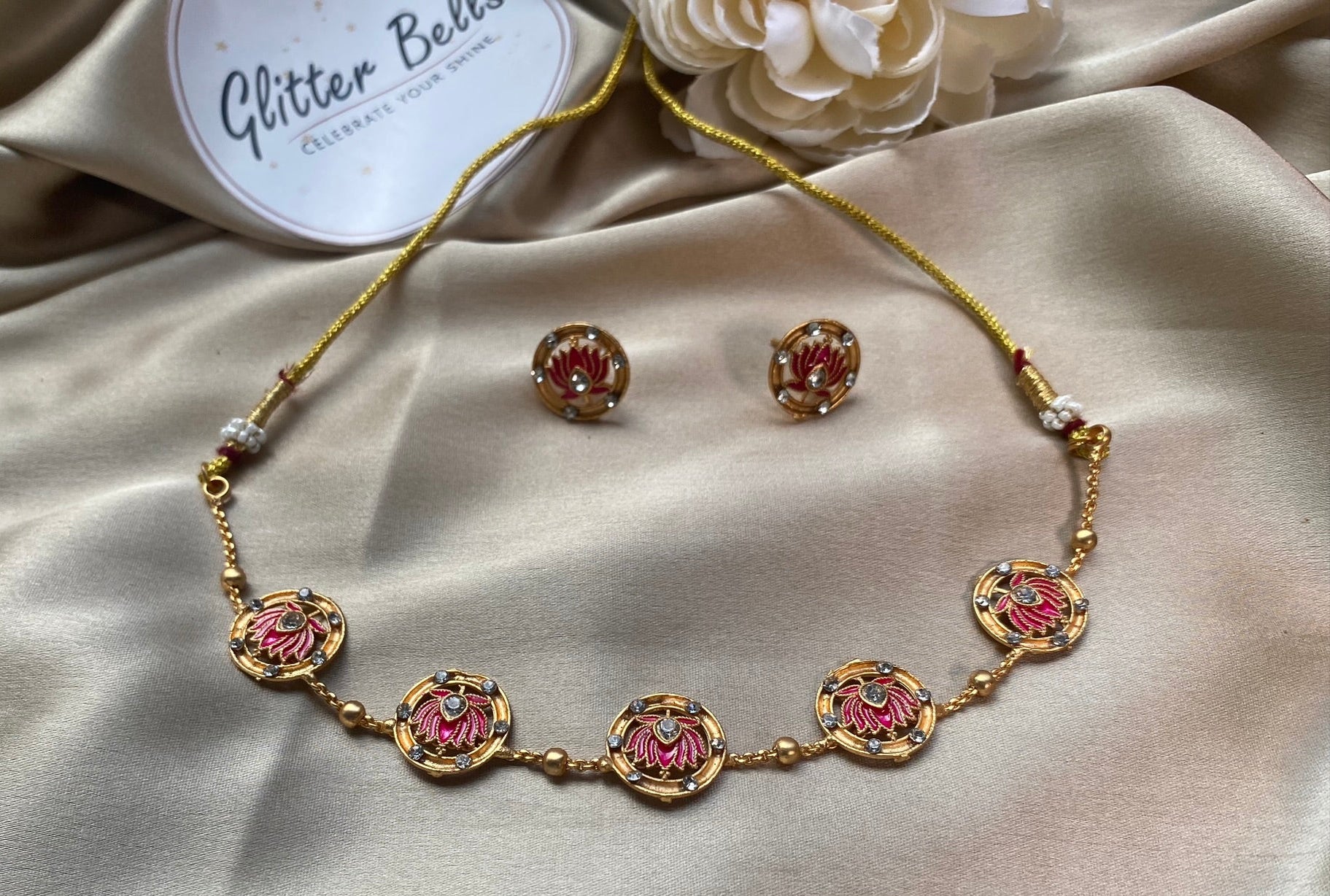 Gold-toned necklace with lotus-in-circle motif design