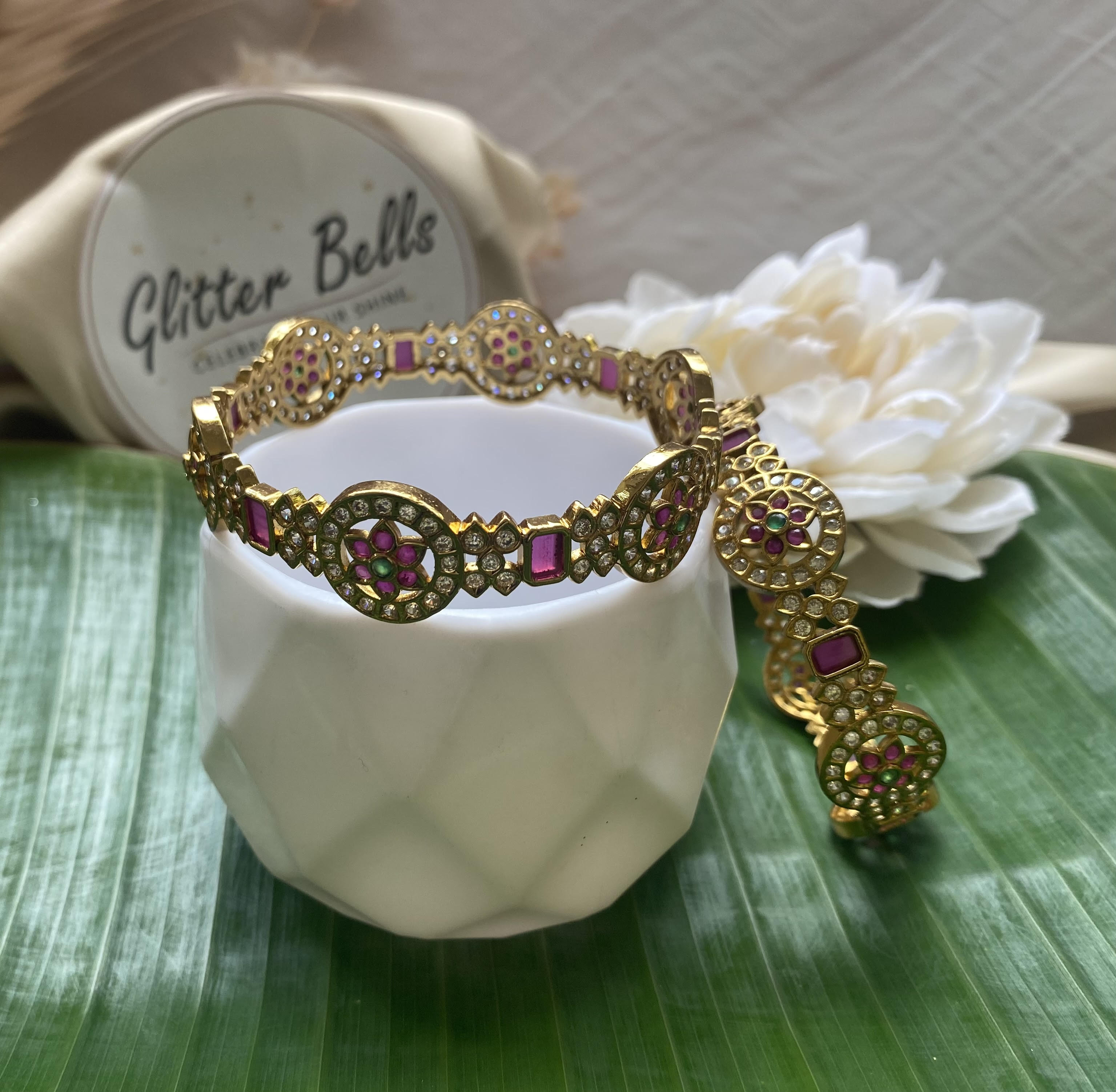 Gold-plated bangles with floral lattice design. Perfect for weddings, festivals, and special occasions.