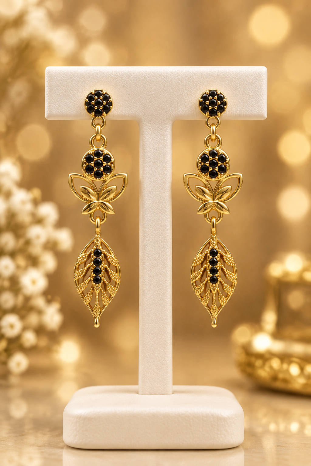 Black Stone Gold Earrings on Display Stand