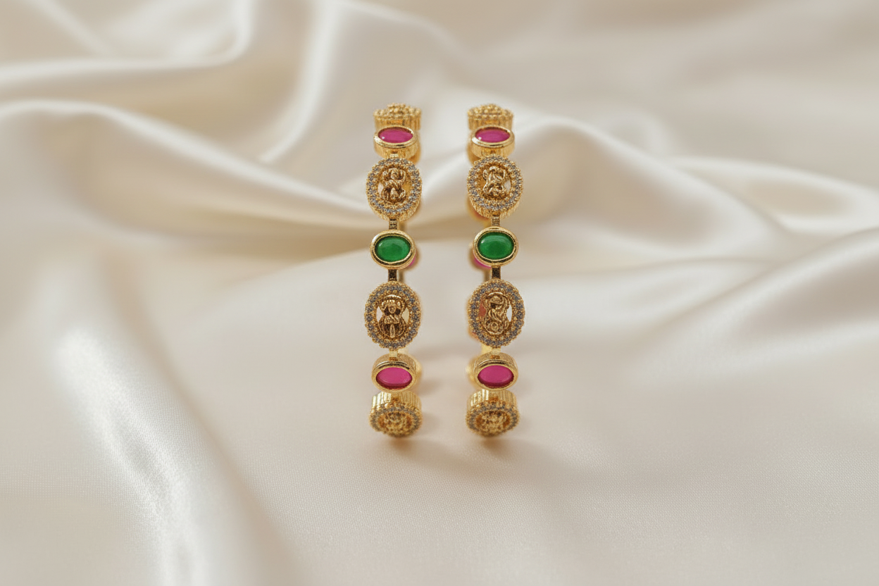 Gold bangles displayed vertically