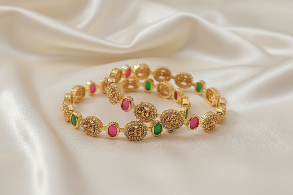 Gold bangles with gemstones