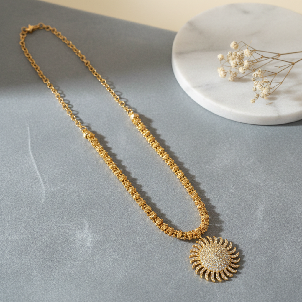 Gold necklace with sun pendant - minimal styling