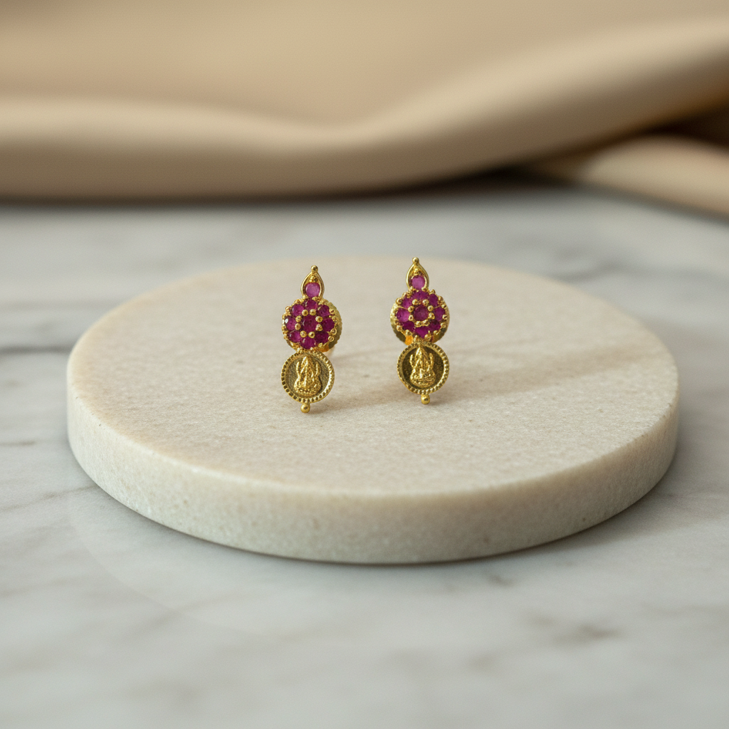 Gold earrings with pink gemstones