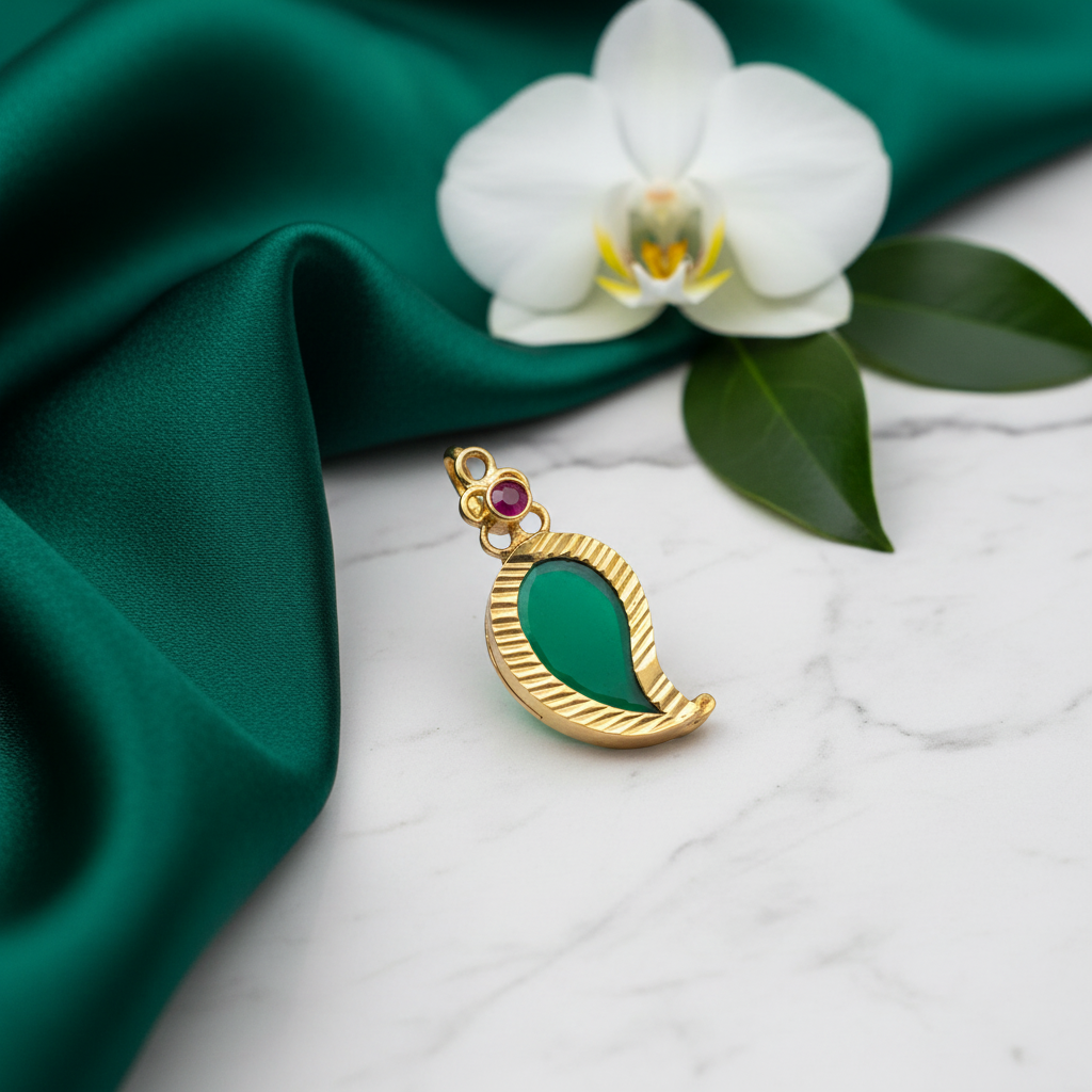 Locket with flat green stone and props